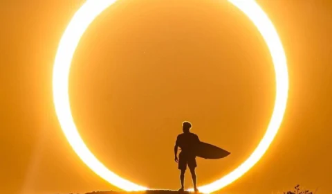 Eclipse solar: fotógrafo revela bastidores de registro com surfista no RN