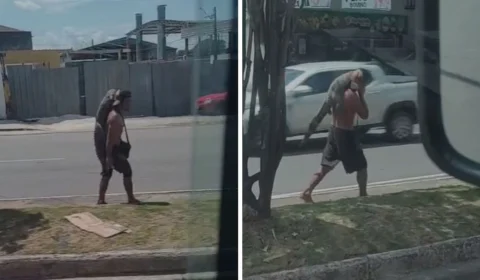 Homem é flagrado carregando jacaré pelas ruas de Manaus; veja vídeo