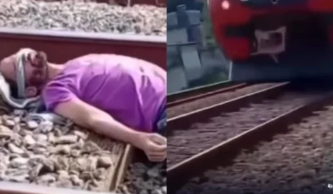 VÍDEO: Homem deita em trilhos com trem se aproximando e câmera flagra segundos de tensão